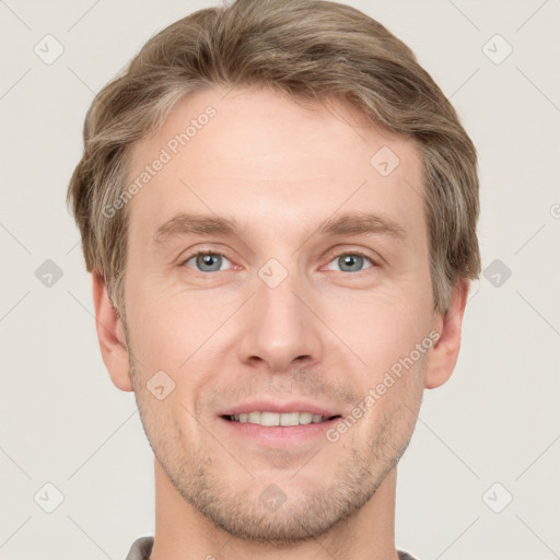 Joyful white adult male with short  brown hair and grey eyes