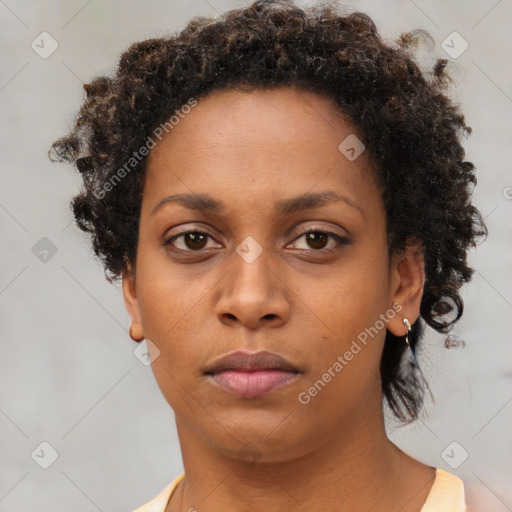 Neutral black young-adult female with short  brown hair and brown eyes