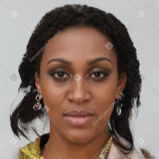 Joyful black young-adult female with medium  brown hair and brown eyes