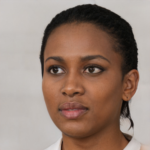 Neutral black young-adult female with short  black hair and brown eyes