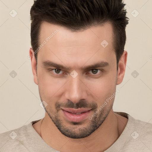 Joyful white young-adult male with short  brown hair and brown eyes