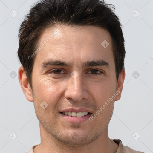 Joyful white young-adult male with short  brown hair and brown eyes