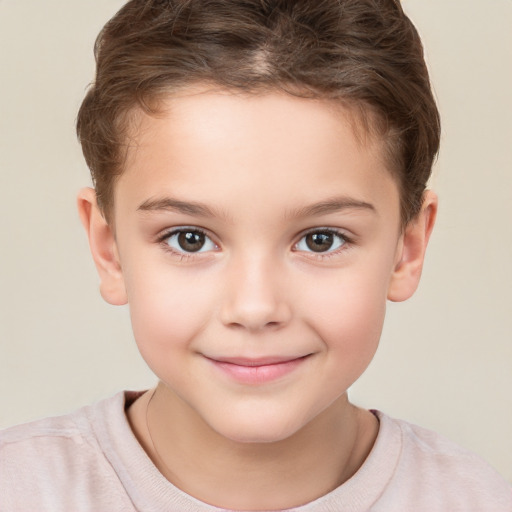 Joyful white child female with short  brown hair and brown eyes