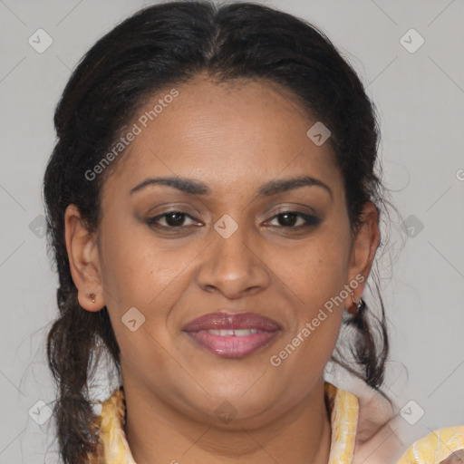 Joyful latino adult female with medium  brown hair and brown eyes