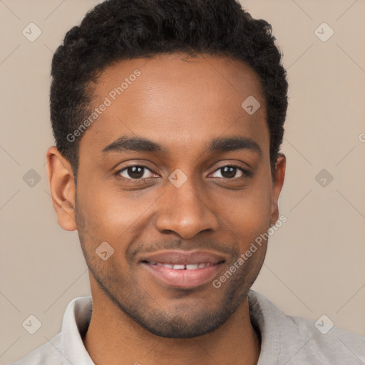 Joyful black young-adult male with short  brown hair and brown eyes