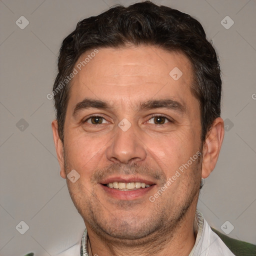 Joyful white adult male with short  brown hair and brown eyes