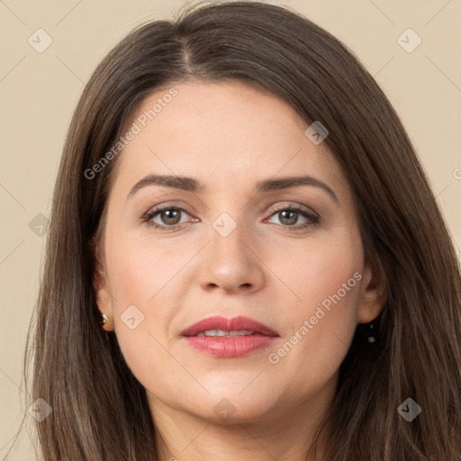 Joyful white young-adult female with long  brown hair and brown eyes