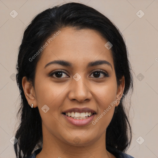 Joyful latino young-adult female with medium  black hair and brown eyes