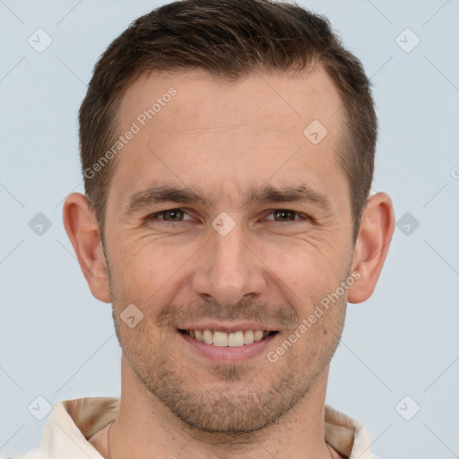 Joyful white adult male with short  brown hair and brown eyes