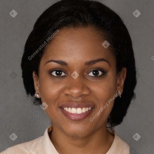 Joyful black young-adult female with long  brown hair and brown eyes