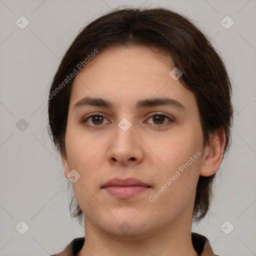 Neutral white young-adult female with short  brown hair and brown eyes