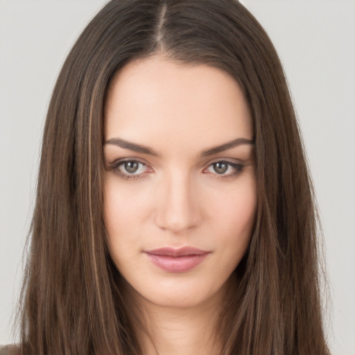 Neutral white young-adult female with long  brown hair and brown eyes