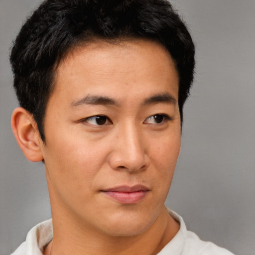 Neutral asian young-adult male with short  brown hair and brown eyes