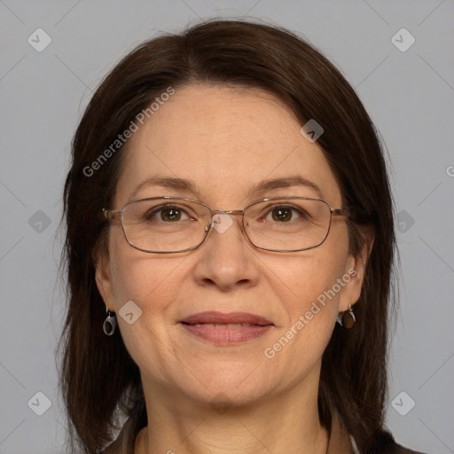 Joyful white adult female with medium  brown hair and grey eyes