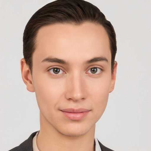 Joyful white young-adult male with short  brown hair and brown eyes