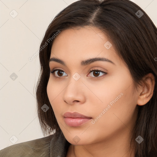 Neutral white young-adult female with long  brown hair and brown eyes