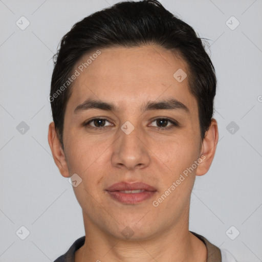 Joyful white young-adult male with short  black hair and brown eyes