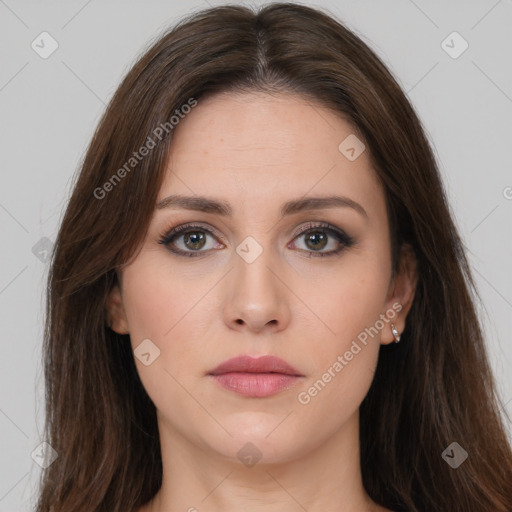 Neutral white young-adult female with long  brown hair and brown eyes