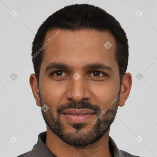 Joyful latino young-adult male with short  black hair and brown eyes