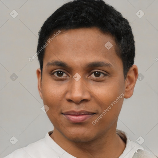 Joyful black young-adult male with short  black hair and brown eyes