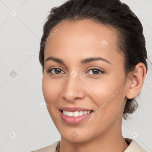 Joyful white young-adult female with medium  brown hair and brown eyes