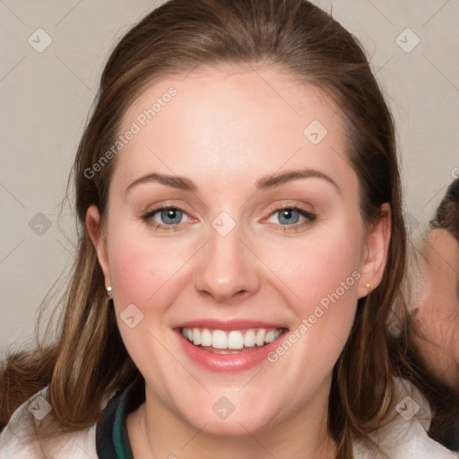 Joyful white young-adult female with medium  brown hair and blue eyes