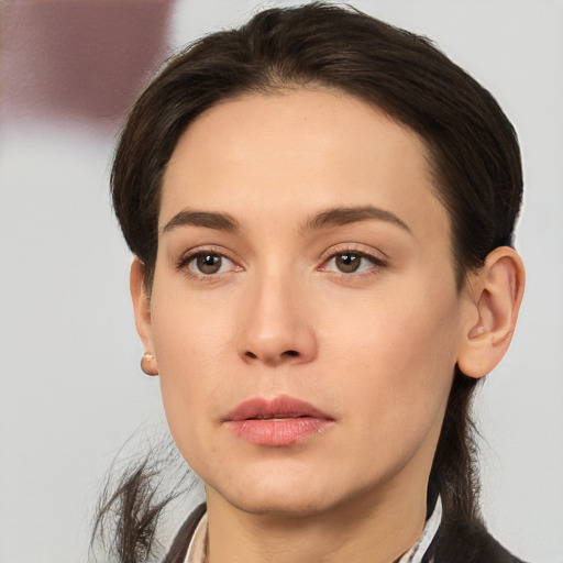 Neutral white young-adult female with short  brown hair and brown eyes