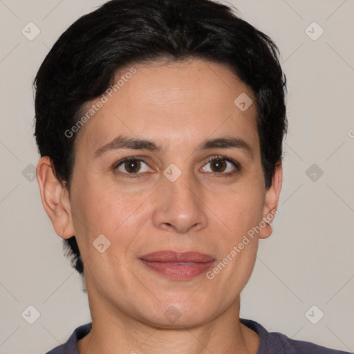 Joyful white adult female with short  brown hair and brown eyes