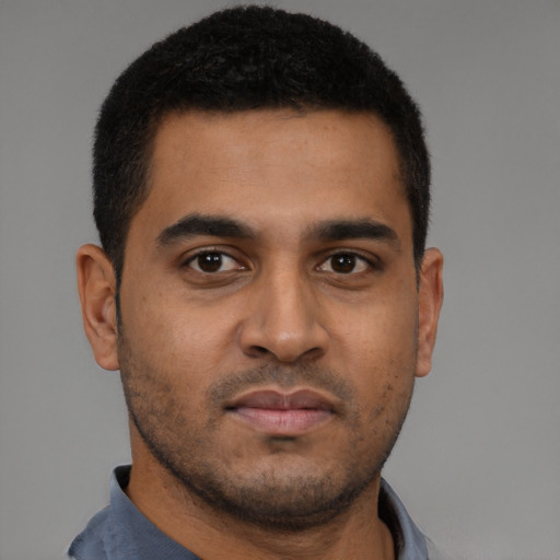 Neutral black young-adult male with short  brown hair and brown eyes