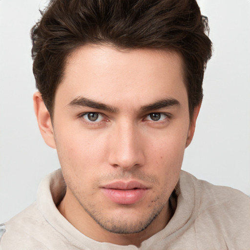 Neutral white young-adult male with short  brown hair and brown eyes