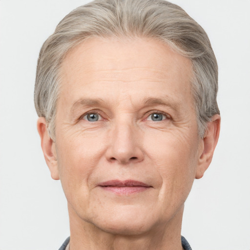 Joyful white middle-aged male with short  gray hair and grey eyes