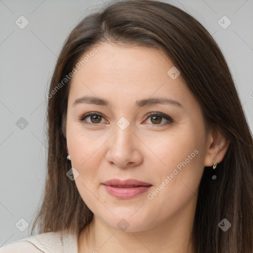 Joyful white young-adult female with long  brown hair and brown eyes