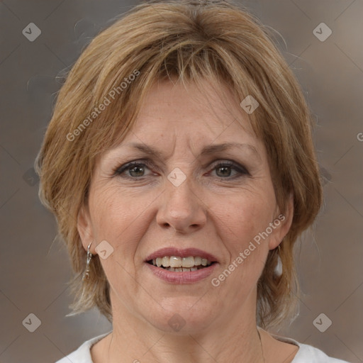 Joyful white adult female with medium  brown hair and brown eyes