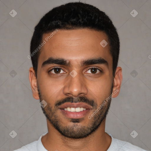 Joyful latino young-adult male with short  black hair and brown eyes