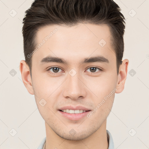 Joyful white young-adult male with short  brown hair and brown eyes