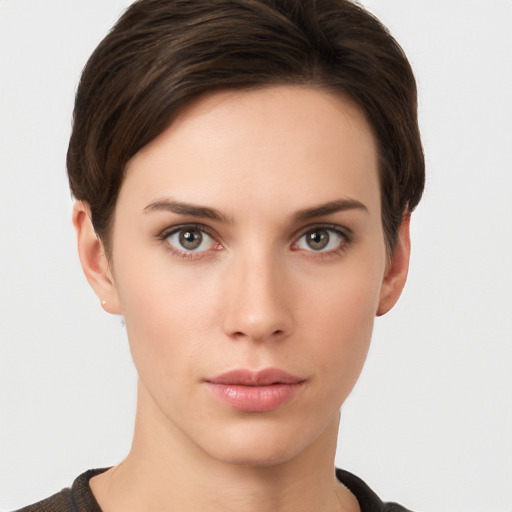 Neutral white young-adult female with short  brown hair and brown eyes