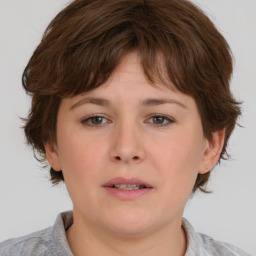 Neutral white young-adult female with medium  brown hair and brown eyes