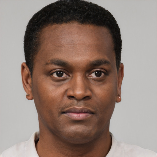 Neutral black young-adult male with short  brown hair and brown eyes