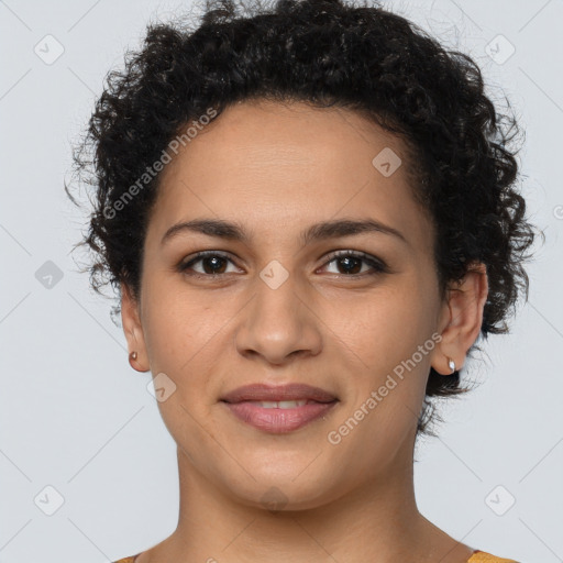 Joyful latino young-adult female with short  brown hair and brown eyes