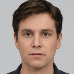 Neutral white adult male with short  brown hair and brown eyes