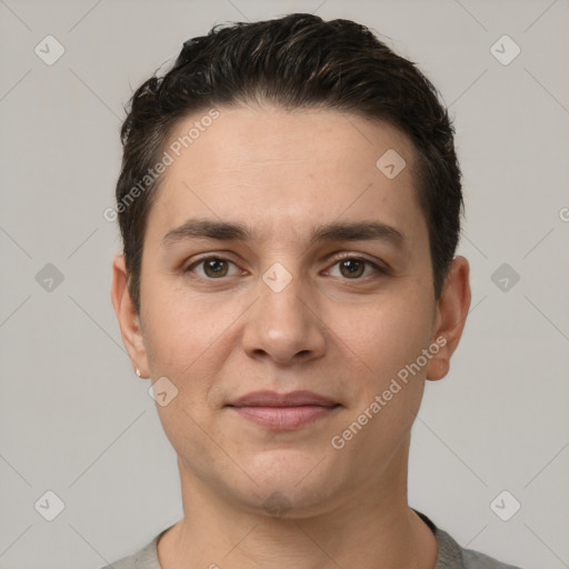 Joyful white young-adult male with short  brown hair and brown eyes