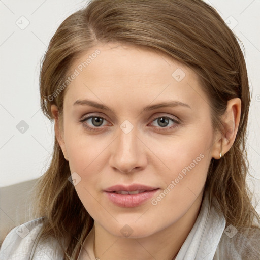 Joyful white young-adult female with medium  brown hair and blue eyes