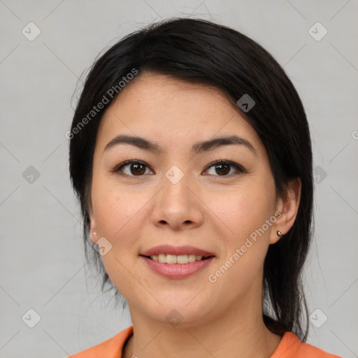 Joyful asian young-adult female with medium  black hair and brown eyes