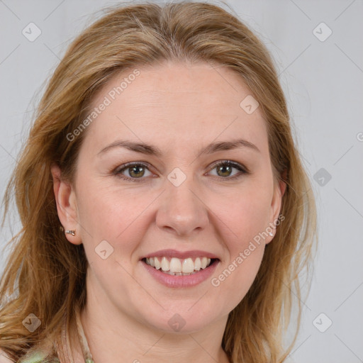 Joyful white adult female with long  brown hair and brown eyes