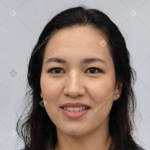 Joyful asian young-adult female with long  brown hair and brown eyes