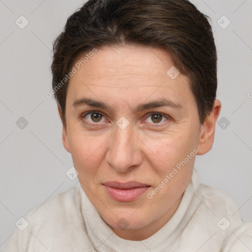 Joyful white adult female with short  brown hair and brown eyes