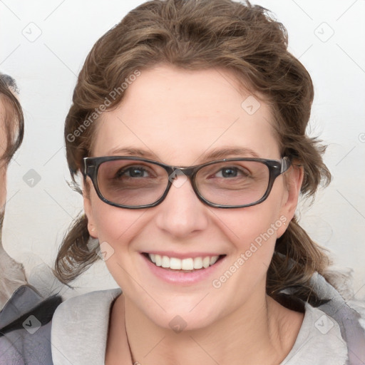 Joyful white young-adult female with medium  brown hair and blue eyes