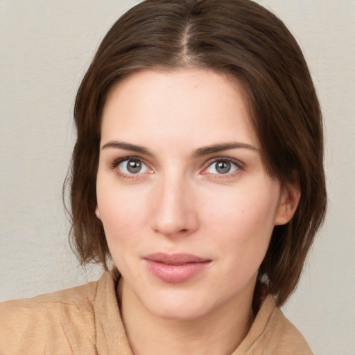 Neutral white young-adult female with medium  brown hair and brown eyes