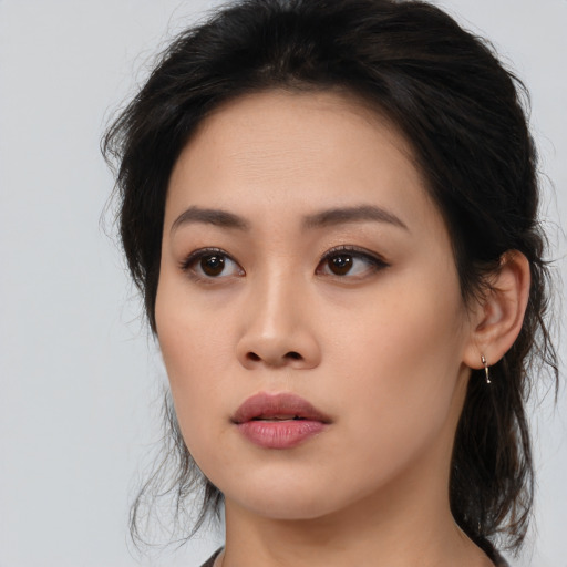 Neutral asian young-adult female with medium  brown hair and brown eyes