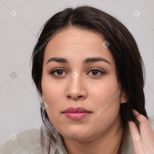 Neutral white young-adult female with medium  brown hair and brown eyes